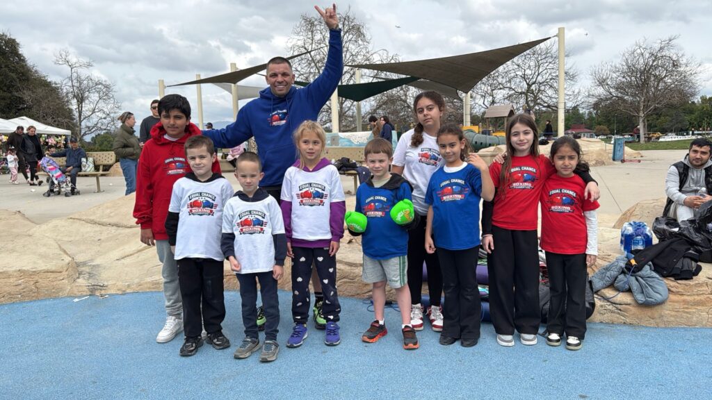 What a Child Learns in the First 90 Days of Boxing Training: A Blueprint for Transformation children practicing boxing drills on grass during outdoor event