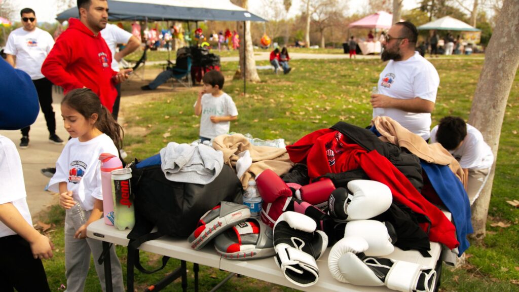 Youth Boxing in the Open Air: Inside Equal Chance Boxing Foundation’s First Community Training close up of boxing gloves symbolizing mental strength and resilience