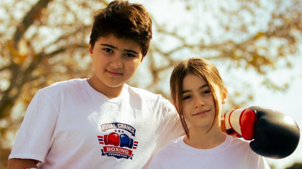 teenager focusing on heavy bag for stress relief and mental health